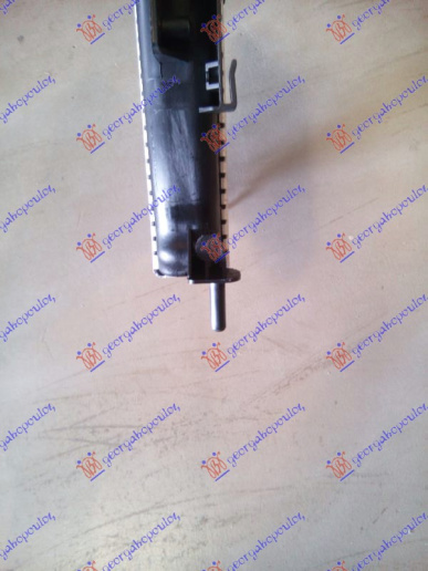 Radiator për motor 1.6-2.0 benzinë (590x450x26) (tubë ana e majtë)